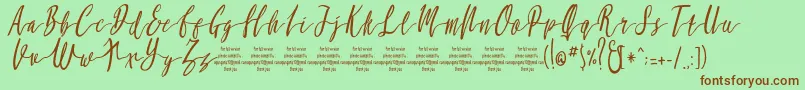 MollucaItalicFree Font – Brown Fonts on Green Background