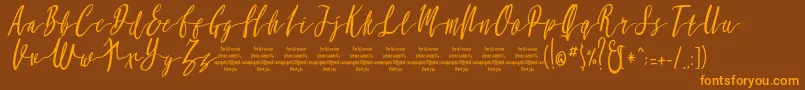 MollucaItalicFree Font – Orange Fonts on Brown Background