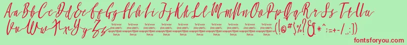 MollucaItalicFree Font – Red Fonts on Green Background