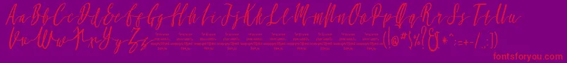 MollucaItalicFree-Schriftart – Rote Schriften auf violettem Hintergrund