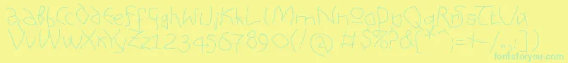 フォントAnAlphaBetIsm Medium – 黄色い背景に緑の文字