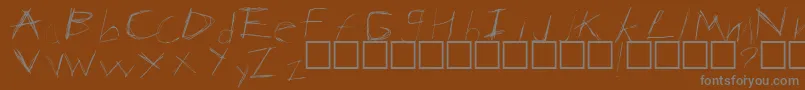 Anarchy Font – Gray Fonts on Brown Background