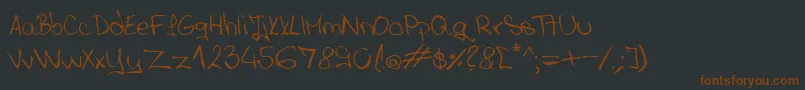 Шрифт ANASPARA – коричневые шрифты на чёрном фоне