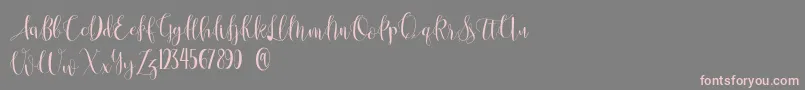 Anastasia -Schriftart – Rosa Schriften auf grauem Hintergrund