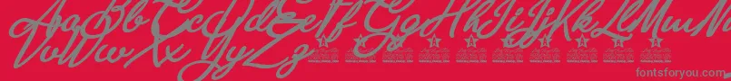 Anastasia Script Personal Use-fontti – harmaat kirjasimet punaisella taustalla
