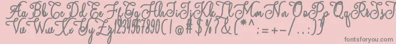 andalan Font – Gray Fonts on Pink Background