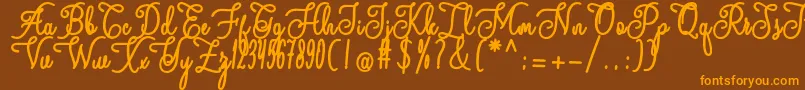 andalan Font – Orange Fonts on Brown Background