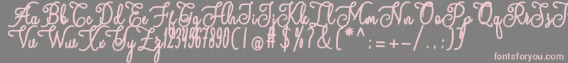 andalan Font – Pink Fonts on Gray Background