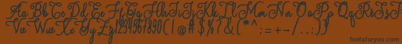 Czcionka andalan – czarne czcionki na brązowym tle