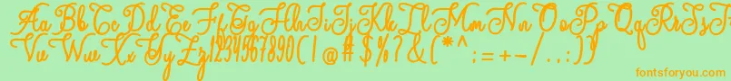 andalan Font – Orange Fonts on Green Background