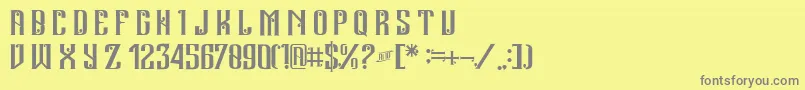 フォントAndalas – 黄色の背景に灰色の文字