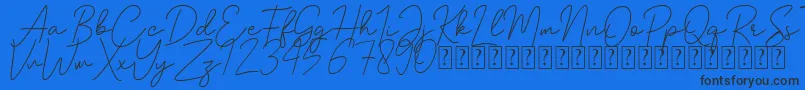 Шрифт Andalusia demo – чёрные шрифты на синем фоне