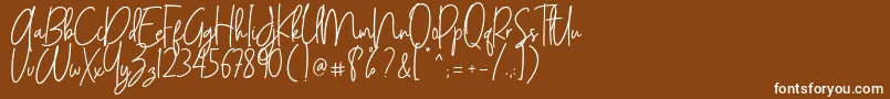ANDALUSYA-Schriftart – Weiße Schriften auf braunem Hintergrund