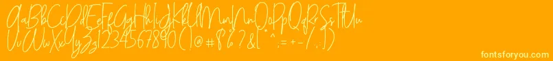 ANDALUSYA Font – Yellow Fonts on Orange Background