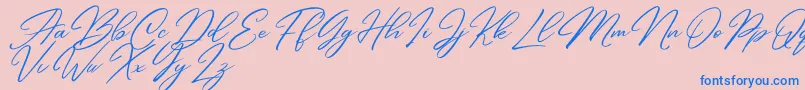 Andasia Demo-Schriftart – Blaue Schriften auf rosa Hintergrund