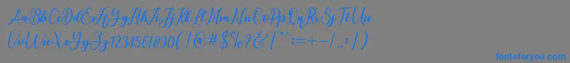 フォントandayani – 灰色の背景に青い文字