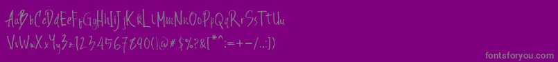 Andecha-fontti – harmaat kirjasimet violetilla taustalla