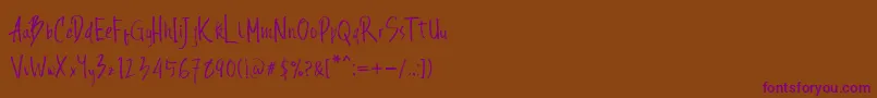 Andecha-Schriftart – Violette Schriften auf braunem Hintergrund