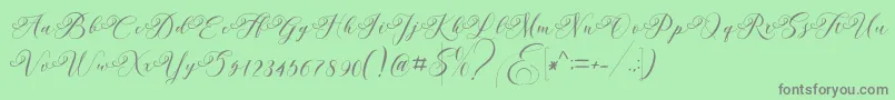 Andeglei-Schriftart – Graue Schriften auf grünem Hintergrund