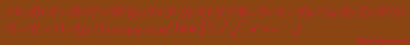 Andeglei-Schriftart – Rote Schriften auf braunem Hintergrund
