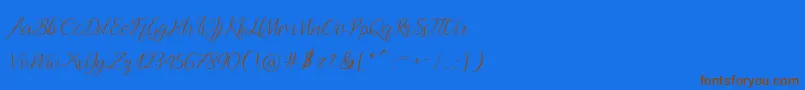 Andella Script Font – Brown Fonts on Blue Background