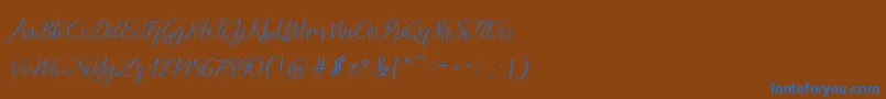 Andella Script-Schriftart – Blaue Schriften auf braunem Hintergrund