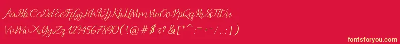 フォントAndella Script – 黄色の文字、赤い背景