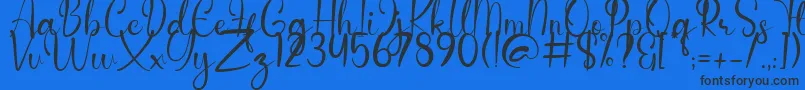 Anderella Demo-Schriftart – Schwarze Schriften auf blauem Hintergrund