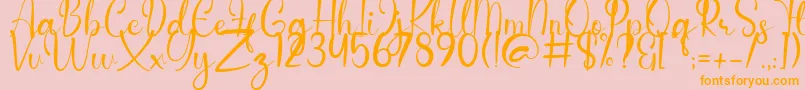 Anderella Demo-Schriftart – Orangefarbene Schriften auf rosa Hintergrund