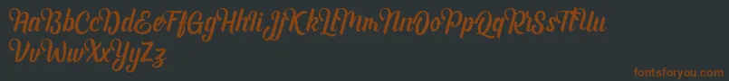 Шрифт Andhyta DEMO – коричневые шрифты на чёрном фоне