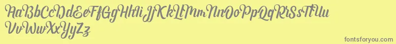 Шрифт Andhyta DEMO – серые шрифты на жёлтом фоне