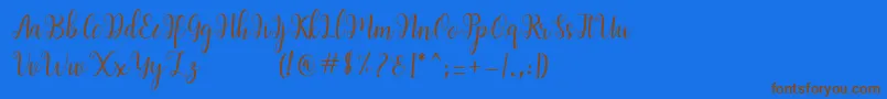 フォントandiney – 茶色の文字が青い背景にあります。