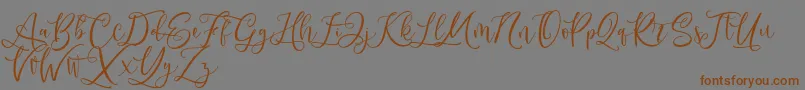 Andriani Script-Schriftart – Braune Schriften auf grauem Hintergrund