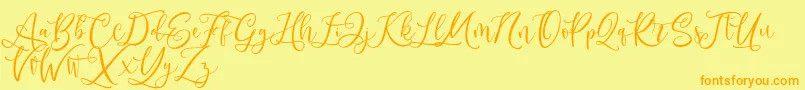Fonte Andriani Script – fontes laranjas em um fundo amarelo