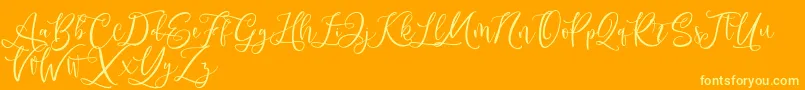 Andriani Script-Schriftart – Gelbe Schriften auf orangefarbenem Hintergrund