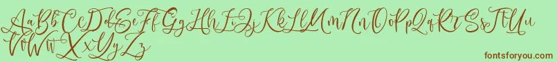 Andriani Script-Schriftart – Braune Schriften auf grünem Hintergrund