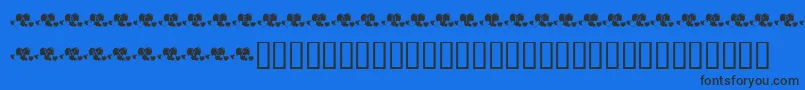 KrLotsOfHearts-Schriftart – Schwarze Schriften auf blauem Hintergrund