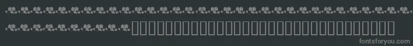 フォントKrLotsOfHearts – 黒い背景に灰色の文字