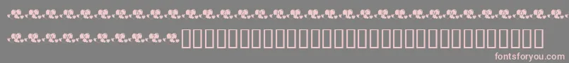 KrLotsOfHearts-fontti – vaaleanpunaiset fontit harmaalla taustalla