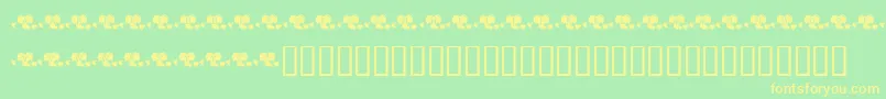 KrLotsOfHearts Font – Yellow Fonts on Green Background