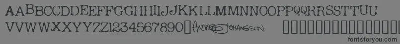 ANDRT   -Schriftart – Schwarze Schriften auf grauem Hintergrund