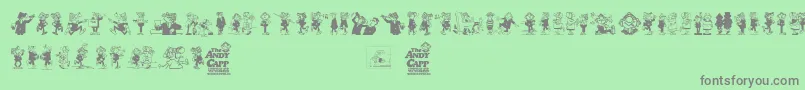 フォントAndy Capp – 緑の背景に灰色の文字