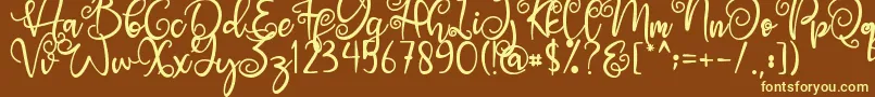 Angel Maleficent-fontti – keltaiset fontit ruskealla taustalla