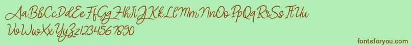 fuente Angel Signature Italic – Fuentes Marrones Sobre Fondo Verde