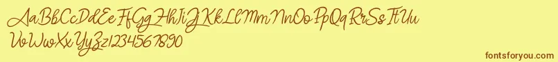 Fonte Angel Signature Italic – fontes marrons em um fundo amarelo