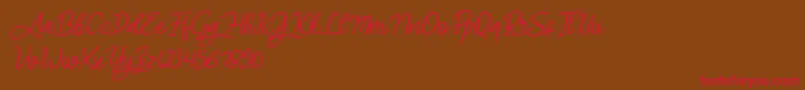 Angel Signature Italic-Schriftart – Rote Schriften auf braunem Hintergrund