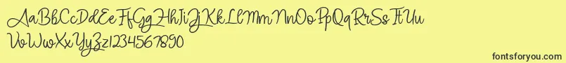 Angel Signature Font – Black Fonts on Yellow Background