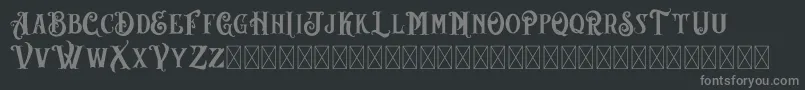 AngeLBilsh Demo-fontti – harmaat kirjasimet mustalla taustalla
