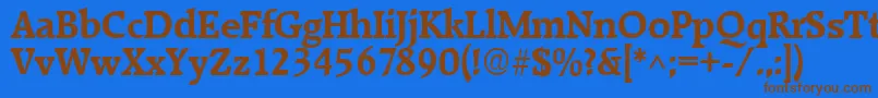 フォントRaleighBold – 茶色の文字が青い背景にあります。