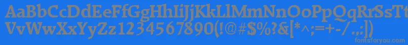 フォントRaleighBold – 青い背景に灰色の文字